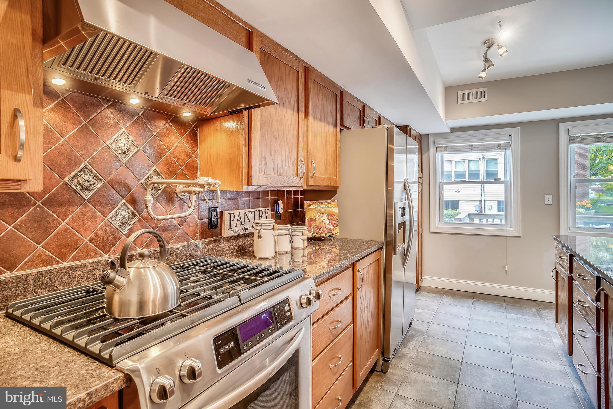 1462 Spring Road Northwest Washington, DC 20010 - Photo 16 of 61 Gourmet Kitchen with Gas Stove & Pot Filler
