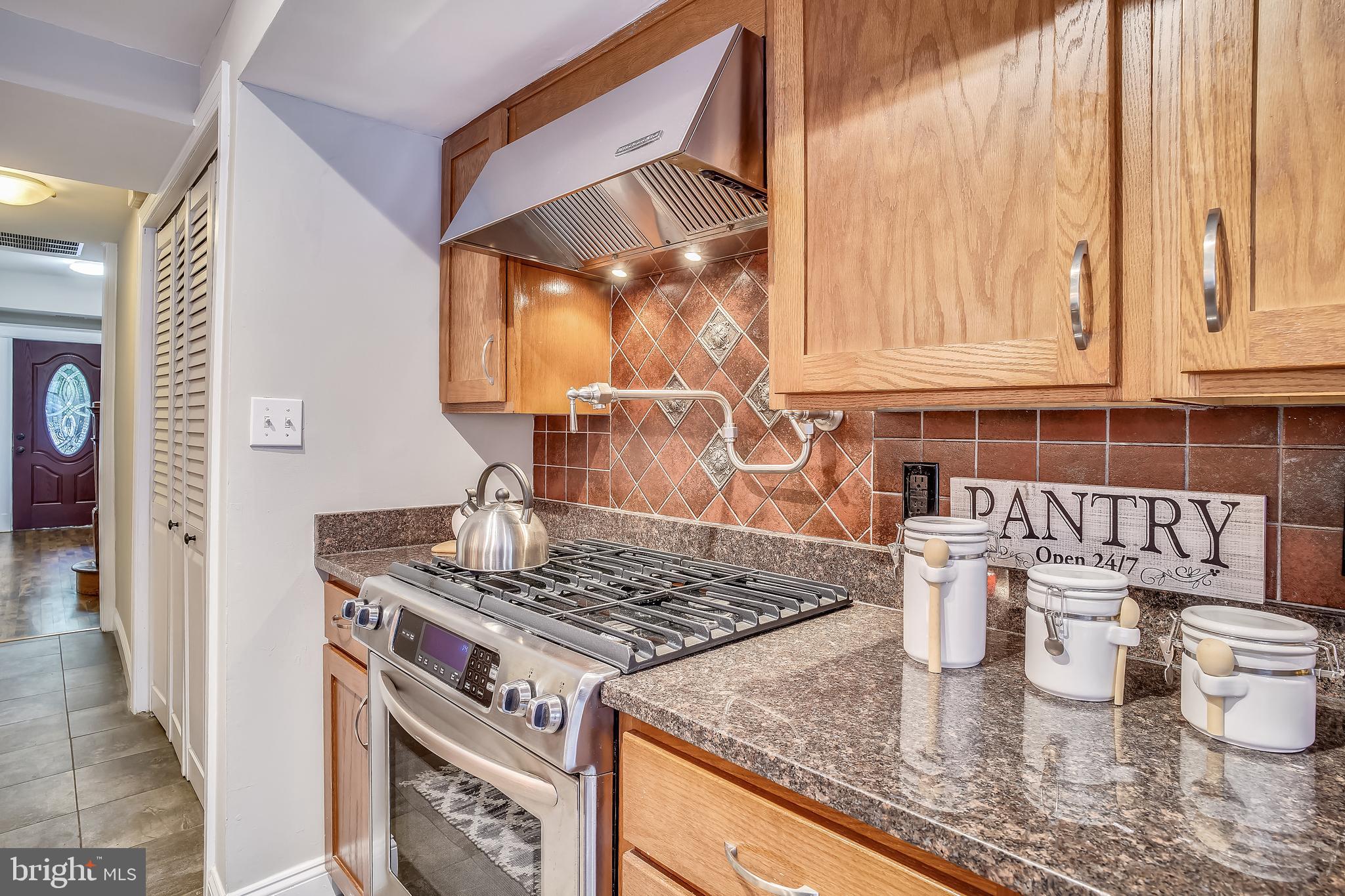 1462 Spring Road Northwest Washington, DC 20010 - Photo 17 of 61 Granite Countertops and Hardwood Cabinets
