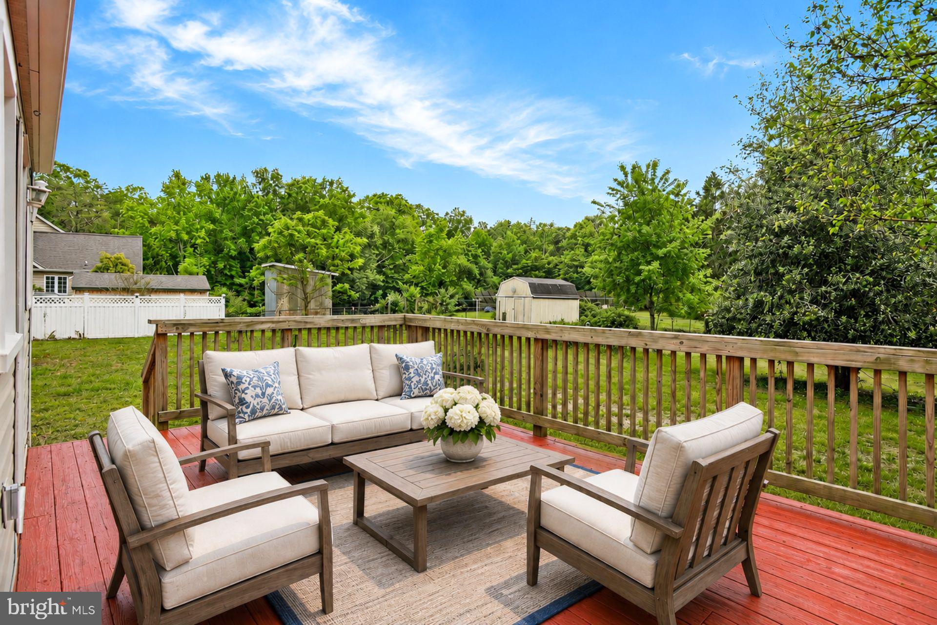 8965 Poorhouse Road Port Tobacco, MD 20677 - Photo 2 of 18 a balcony with furniture
