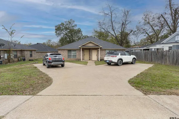 a car parked in front of a house