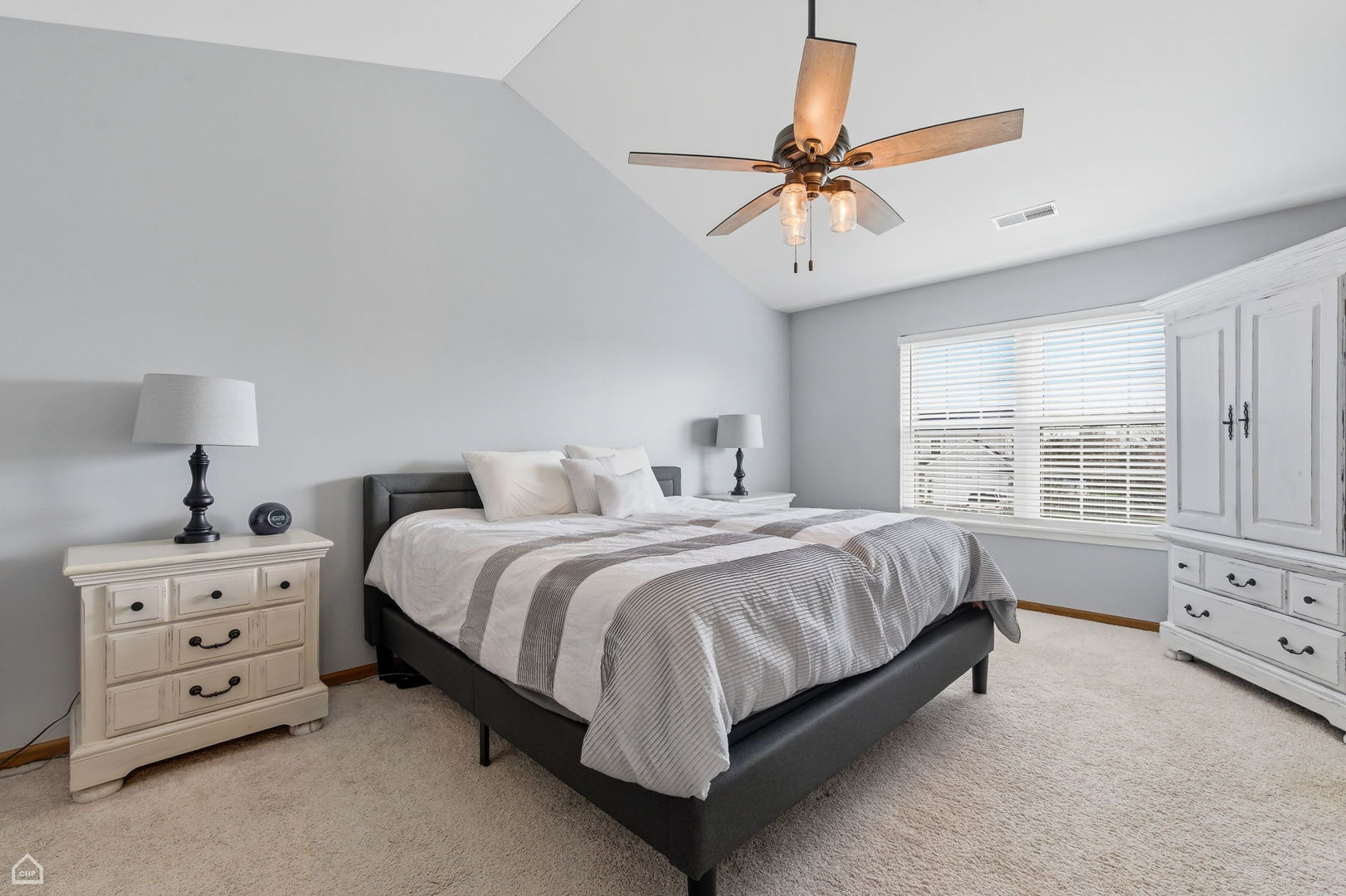 617 Brita Trail Minooka, IL 60447 - Photo 15 of 34 a spacious bedroom with a bed and a window