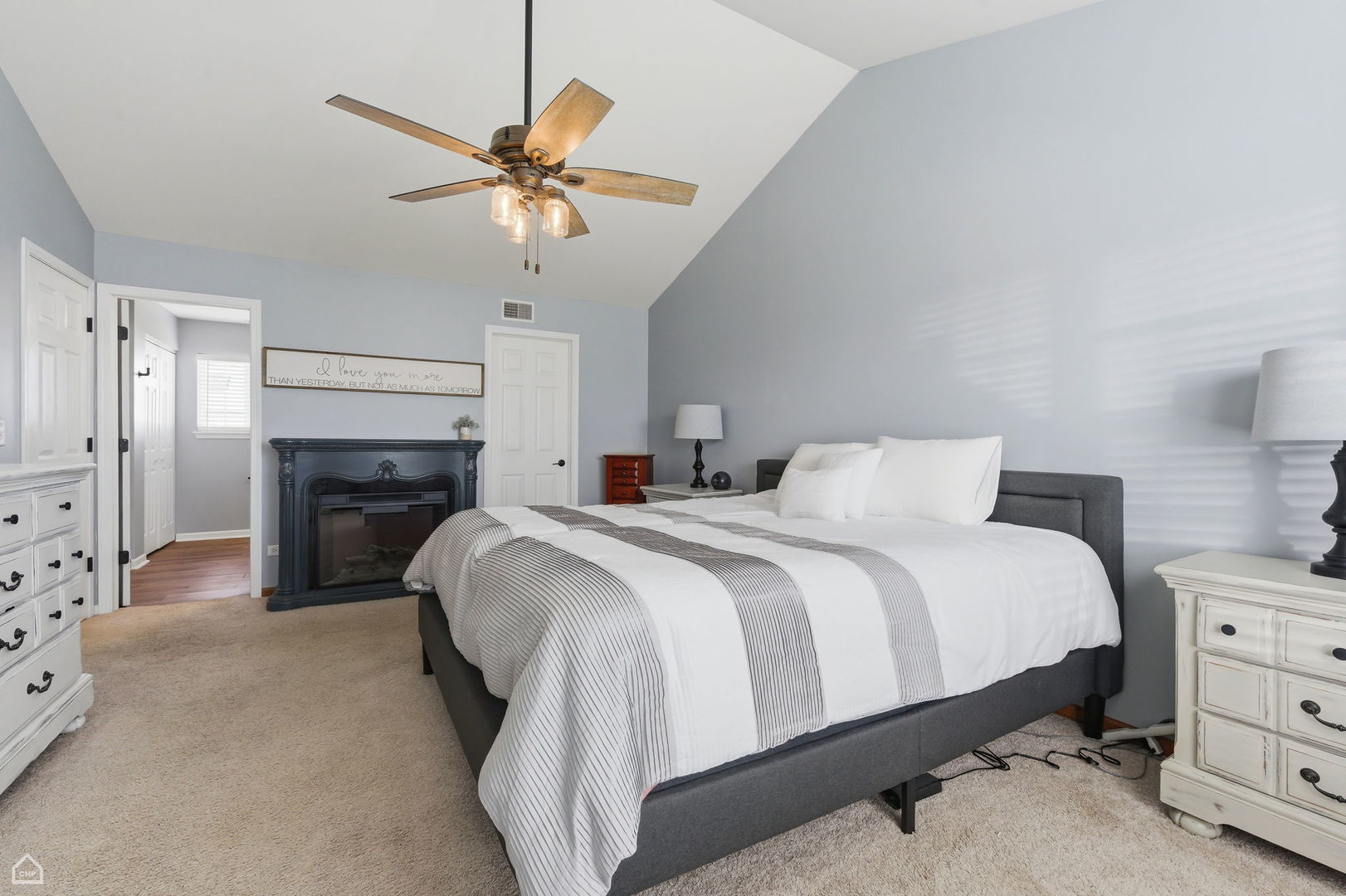 617 Brita Trail Minooka, IL 60447 - Photo 16 of 34 a bedroom with a bed and a ceiling fan