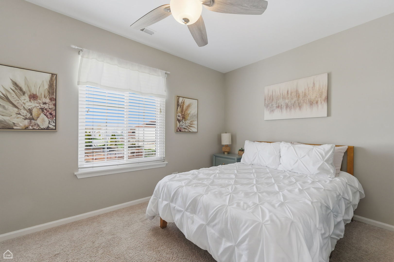 617 Brita Trail Minooka, IL 60447 - Photo 19 of 34 a large bed sitting in a bedroom next to a window