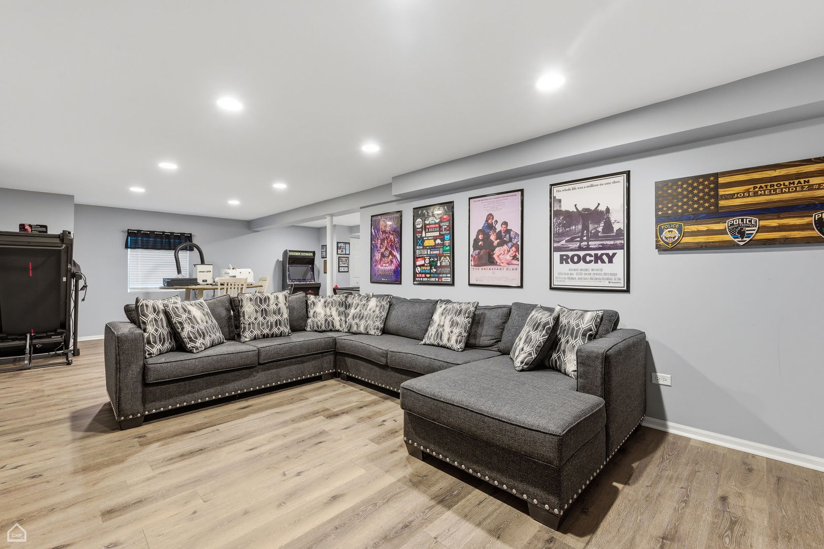 617 Brita Trail Minooka, IL 60447 - Photo 25 of 34 a living room with furniture and a flat screen tv