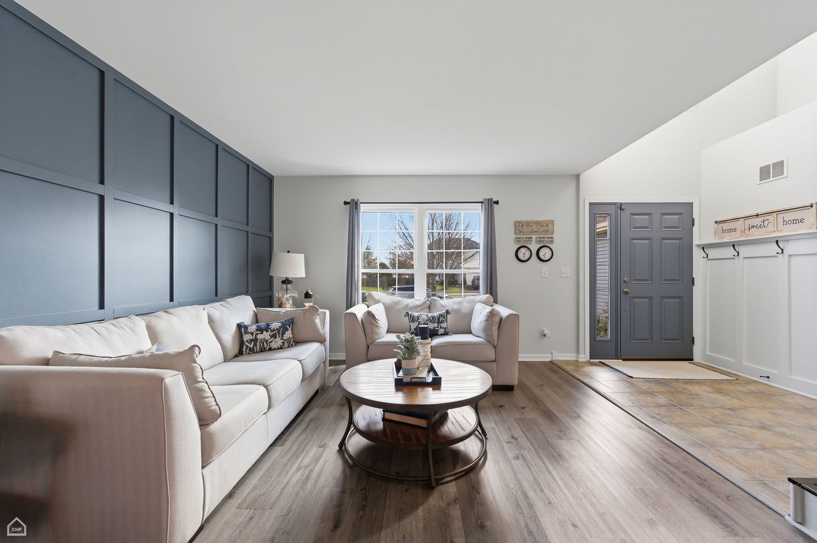 617 Brita Trail Minooka, IL 60447 - Photo 5 of 34 a living room with furniture and a table
