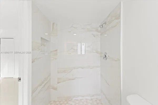 a view of a bathroom with a shower