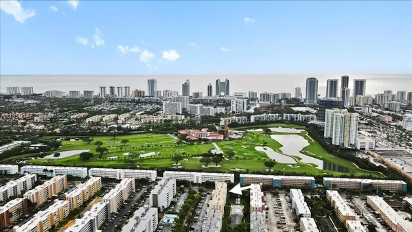 a view of a city with tall buildings