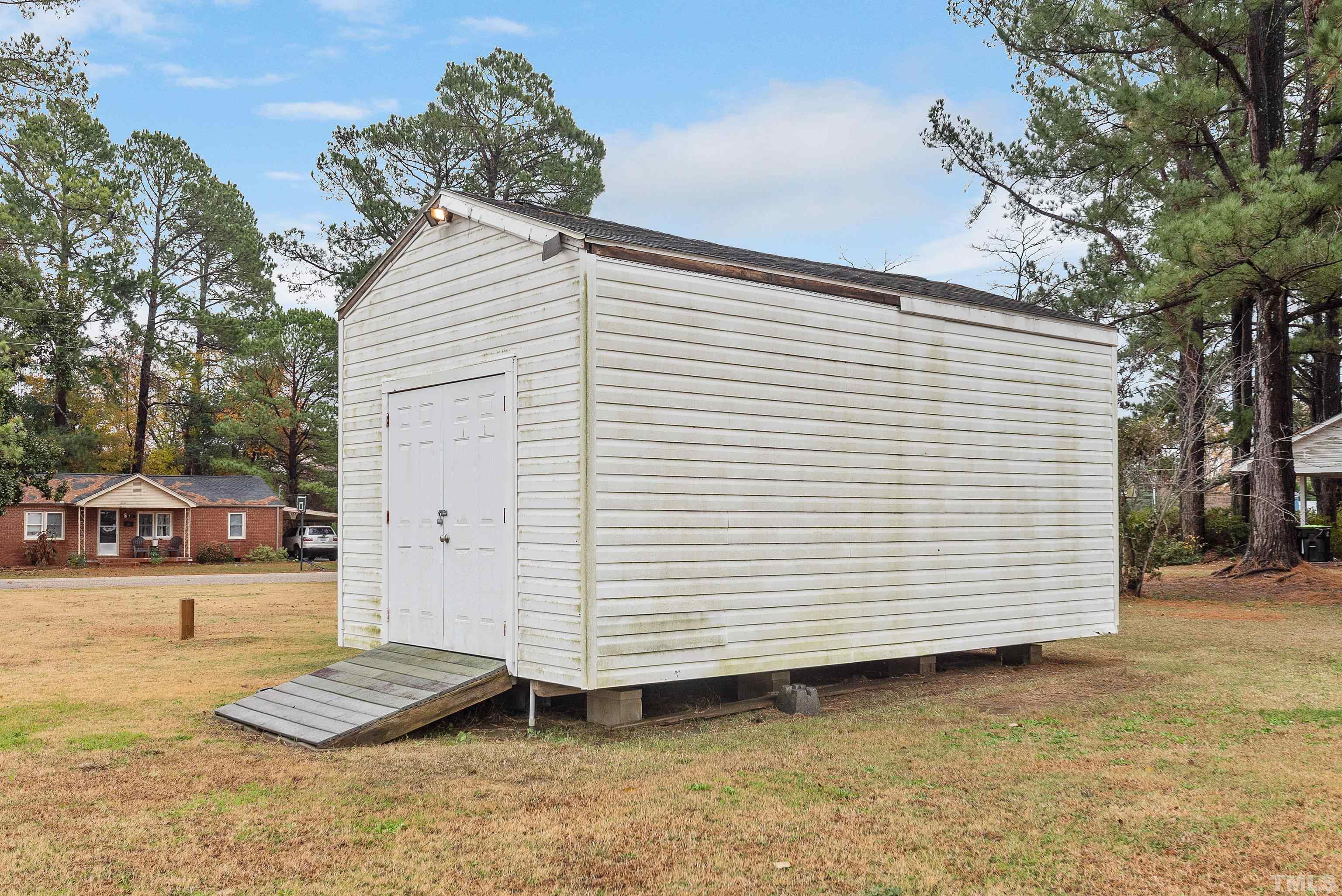 201 West B Street Erwin, NC 28339 - Photo 8 of 25 a view of a back yard of the house