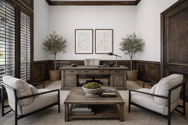 a living room with furniture and a potted plant