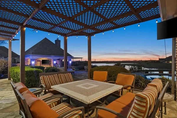 a view of a patio with swimming pool