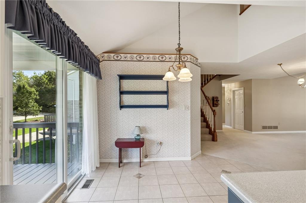 306 Country View Drive Lower Burrell, PA 15068 - Photo 12 of 50 a view of an entryway with wooden floor and a chandelier
