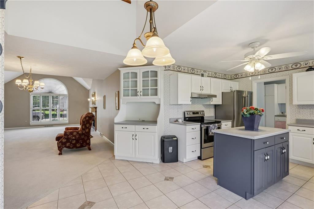 306 Country View Drive Lower Burrell, PA 15068 - Photo 13 of 50 a kitchen with sink cabinets and window