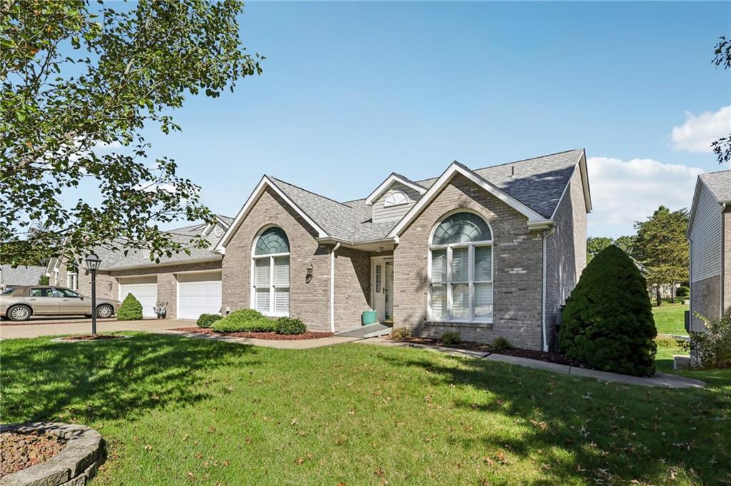 306 Country View Drive Lower Burrell, PA 15068 - Photo 2 of 50 a view of a big house with a big yard and potted plants