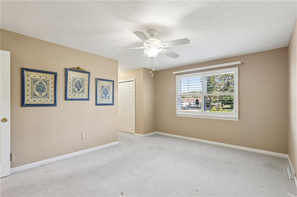 306 Country View Drive Lower Burrell, PA 15068 - Photo 21 of 50 a view of an empty room with a window