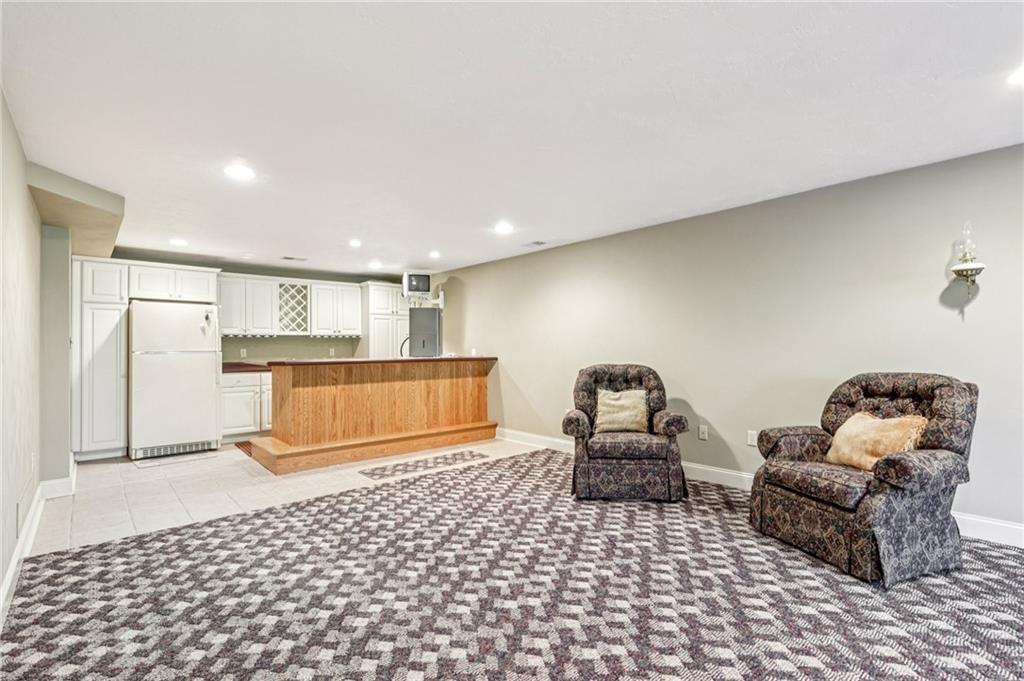 306 Country View Drive Lower Burrell, PA 15068 - Photo 36 of 50 a living room with a couch