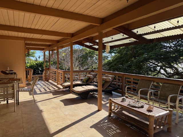 78-6745 Walua Road Kailua-Kona, HI 96740 - Photo 12 of 23 a view of a patio with chairs and a table