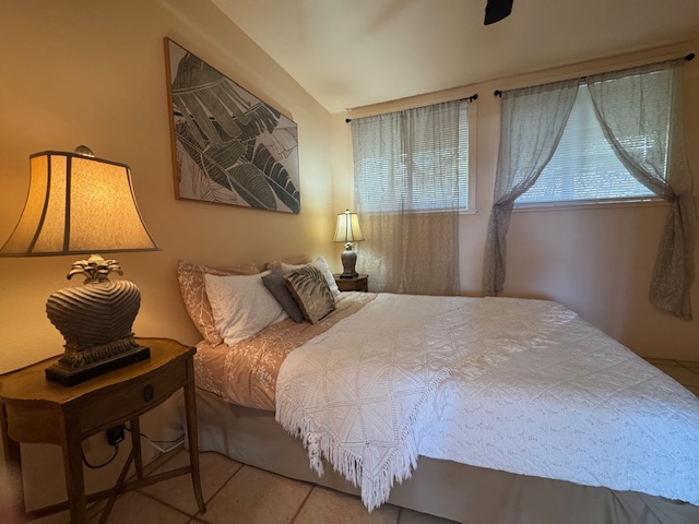 78-6745 Walua Road Kailua-Kona, HI 96740 - Photo 18 of 23 a bedroom with a bed and wooden floor