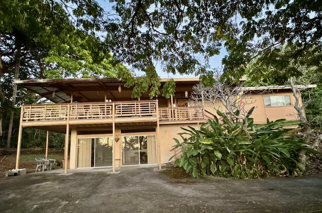 78-6745 Walua Road Kailua-Kona, HI 96740 - Photo 21 of 23 front view of a house with a tree