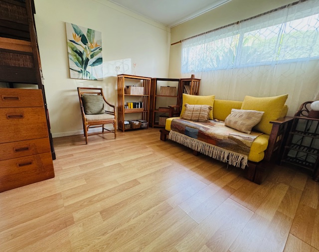 78-6745 Walua Road Kailua-Kona, HI 96740 - Photo 10 of 23 a living room with furniture and a wooden floor