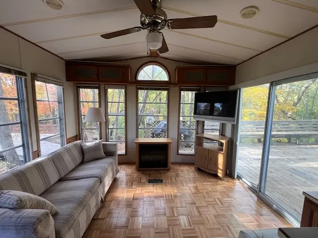 a view of a dining room with furniture window and outside view