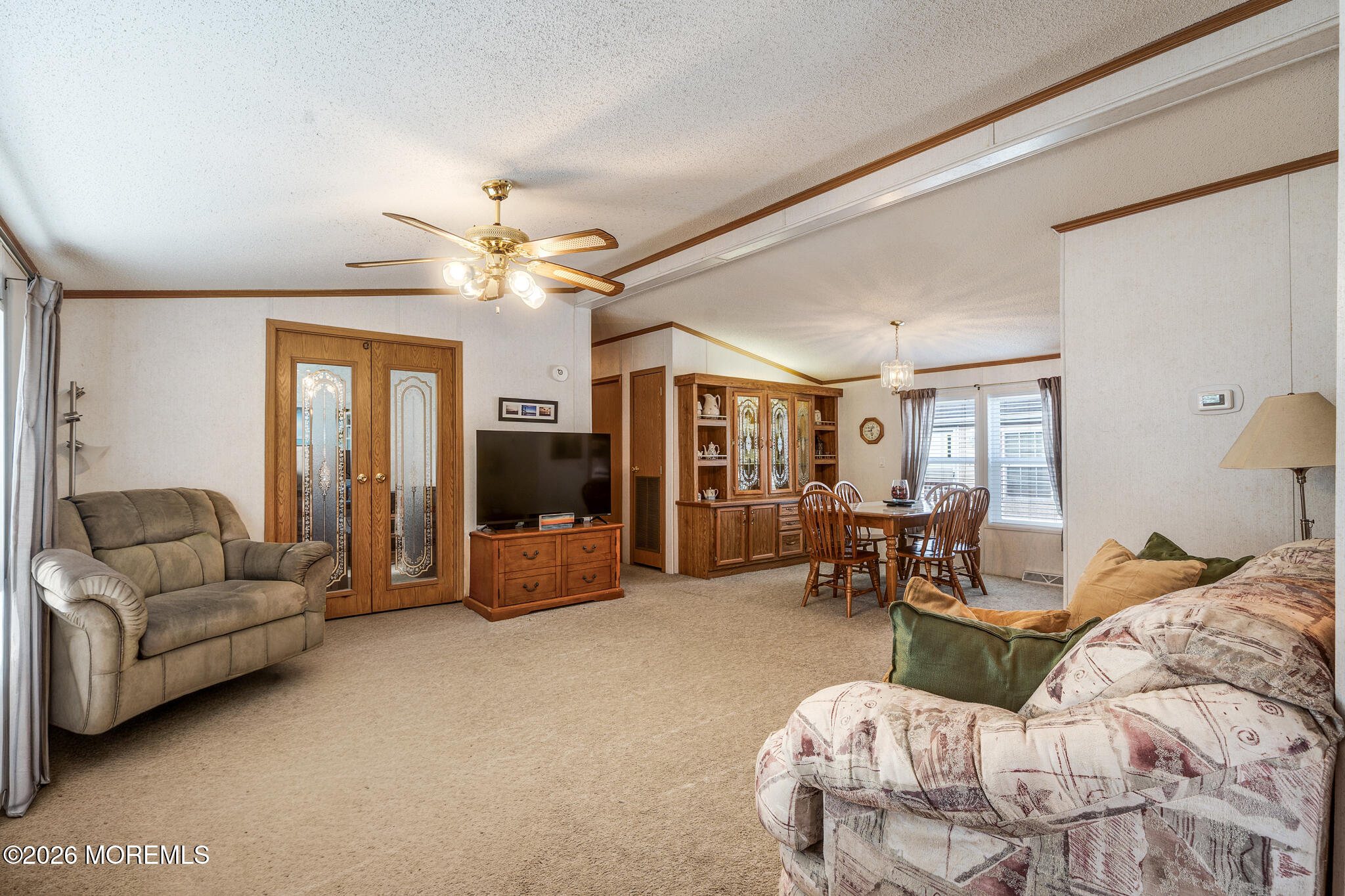78 Village Road Morganville, NJ 07751 - Photo 3 of 25 a living room with furniture and a large window