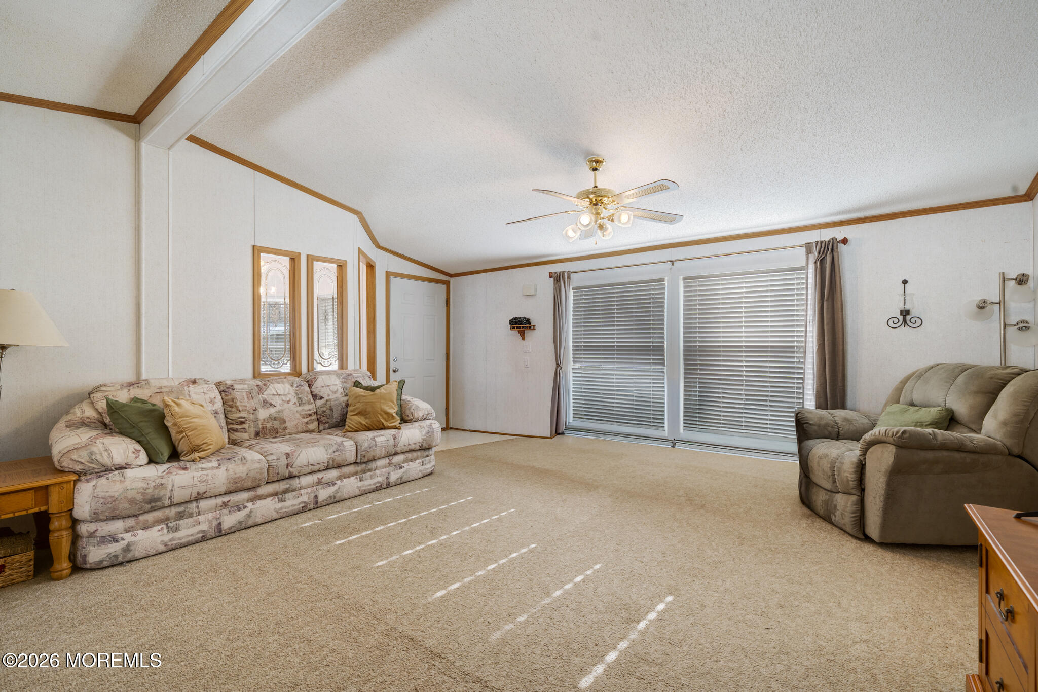 78 Village Road Morganville, NJ 07751 - Photo 5 of 25 a living room with furniture and a large window