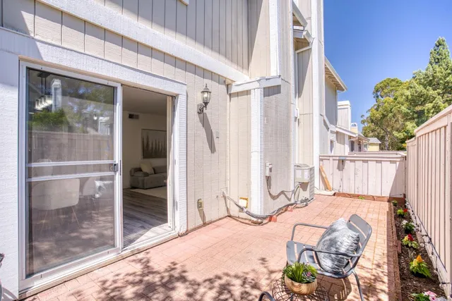 a view of a balcony with chair