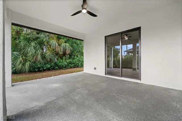 a view of a room with a large window