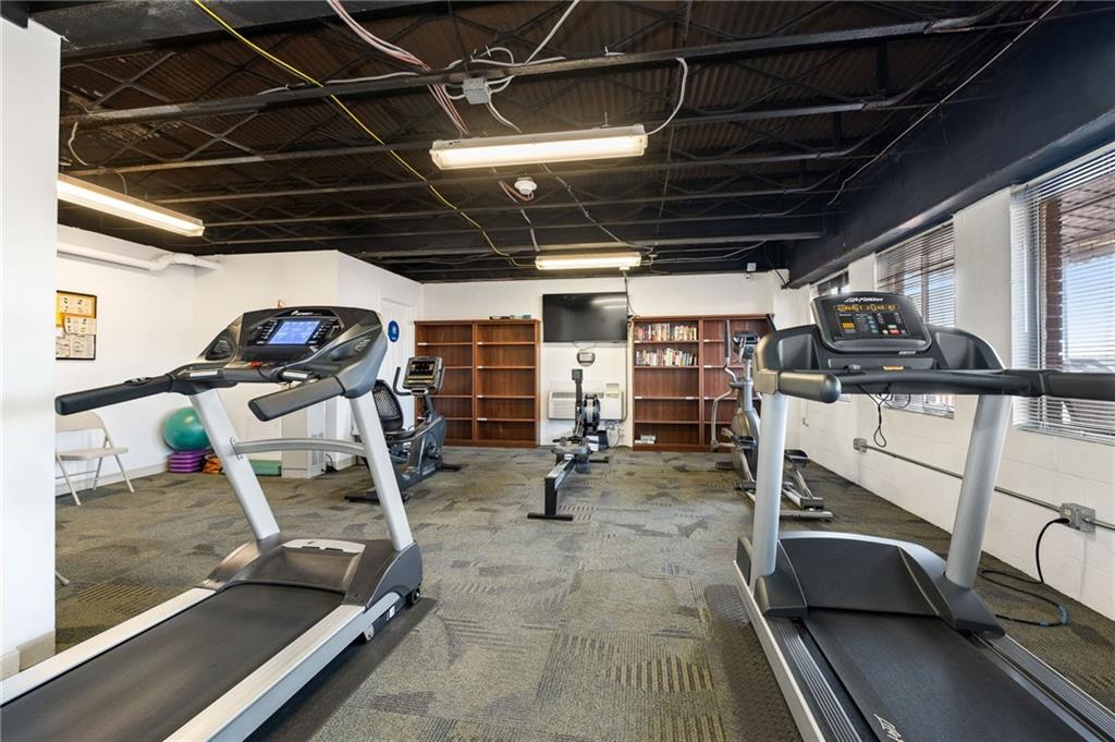 128 North Craig Street, Unit 412 Pittsburgh, PA 15213 - Photo 15 of 17 a room with gym equipment