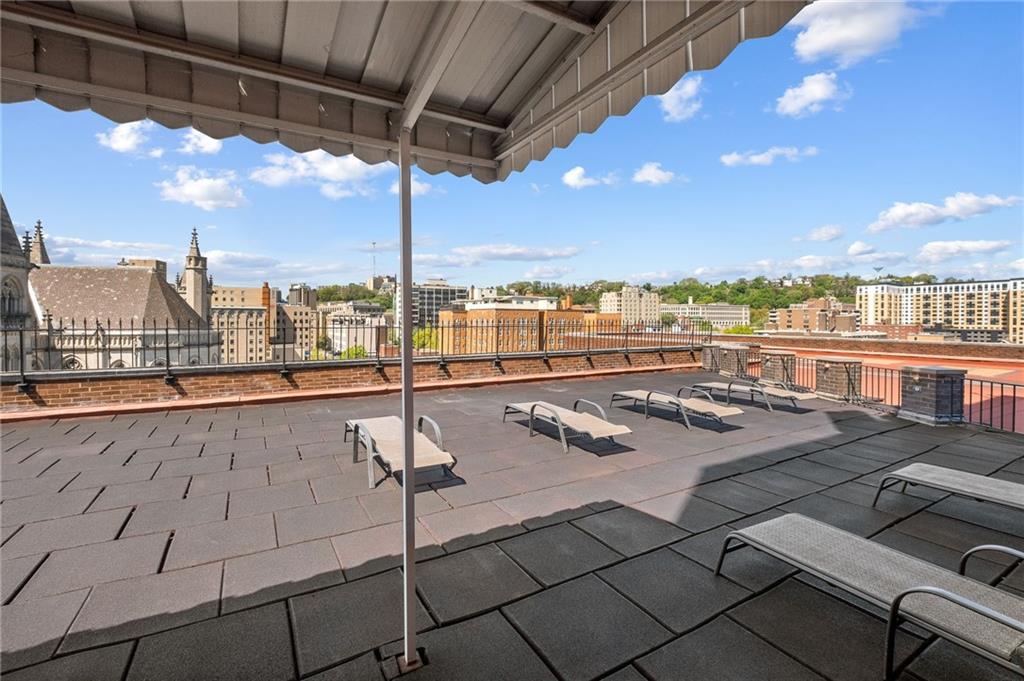 128 North Craig Street, Unit 412 Pittsburgh, PA 15213 - Photo 17 of 17 a view of swimming pool with outdoor seating