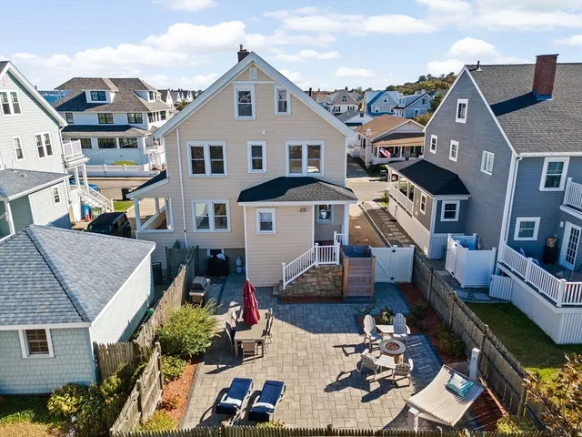 a aerial view of a house with a patio