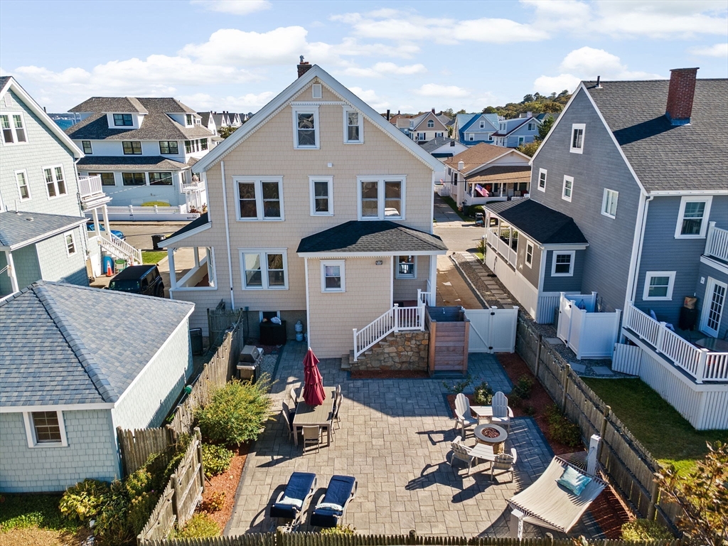79 F Street Hull, MA 02045 - Photo 3 of 35 a aerial view of a house with a patio
