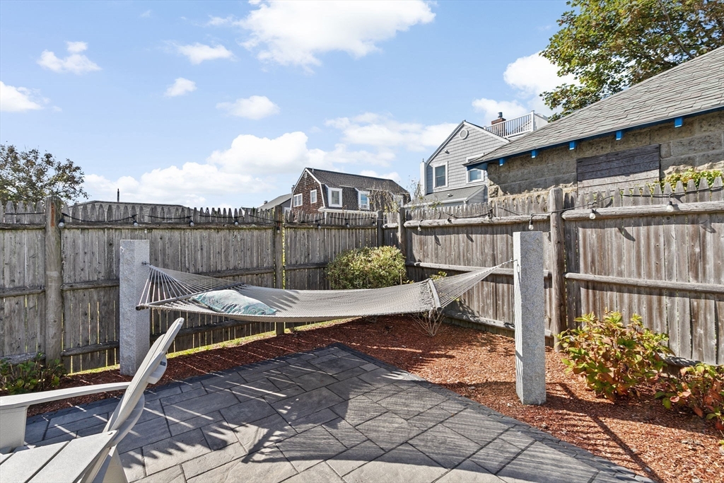 79 F Street Hull, MA 02045 - Photo 31 of 35 a view of a roof deck with wooden fence and a bench