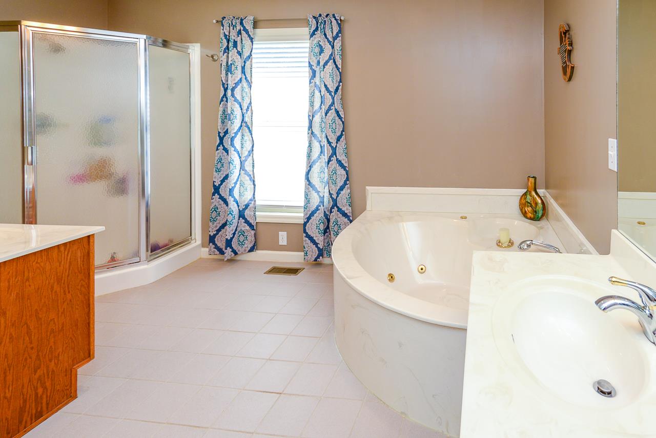 587 Damron Road Estill Springs, TN 37330 - Photo 15 of 30 Master Bath with a jetted soaking tub and separate shower and a large walk-in closet!