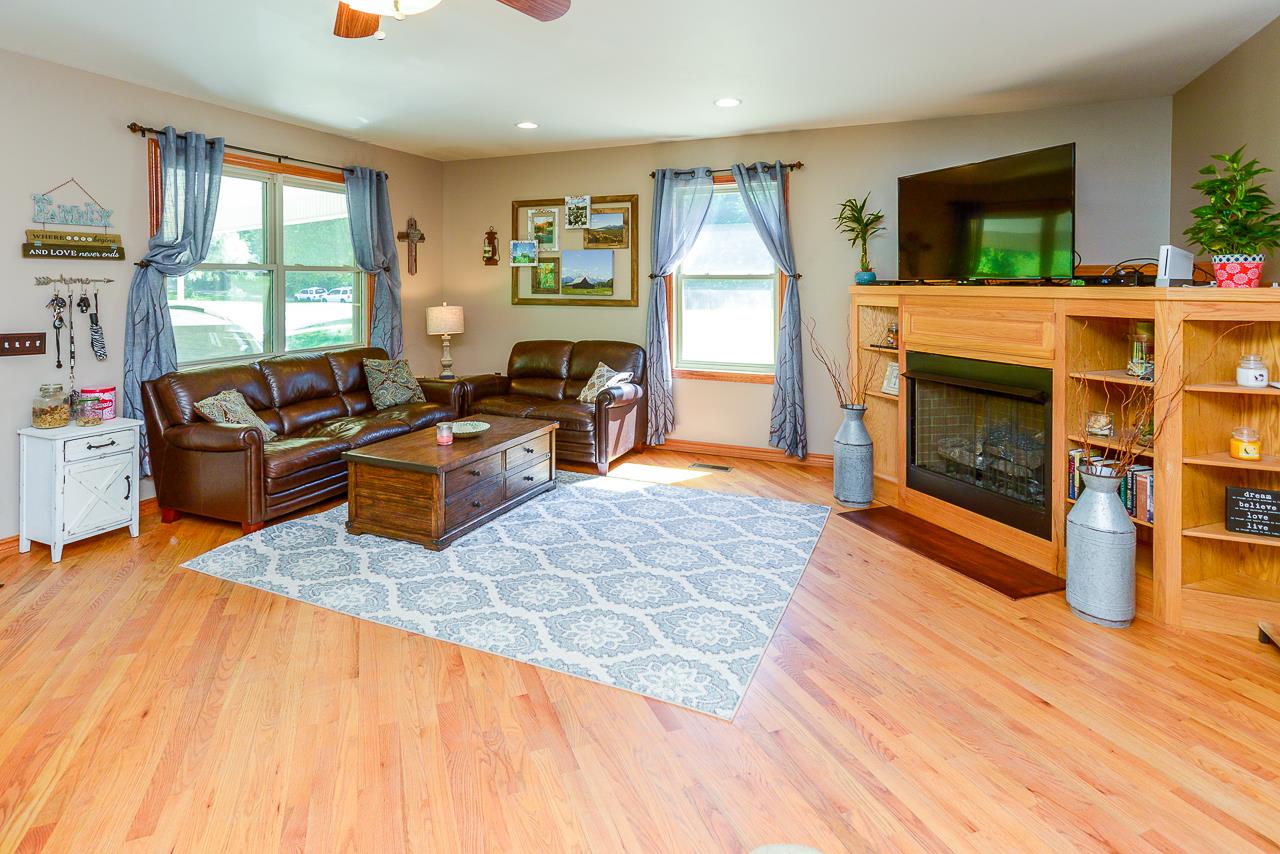 587 Damron Road Estill Springs, TN 37330 - Photo 5 of 30 Large living room with a fireplace.