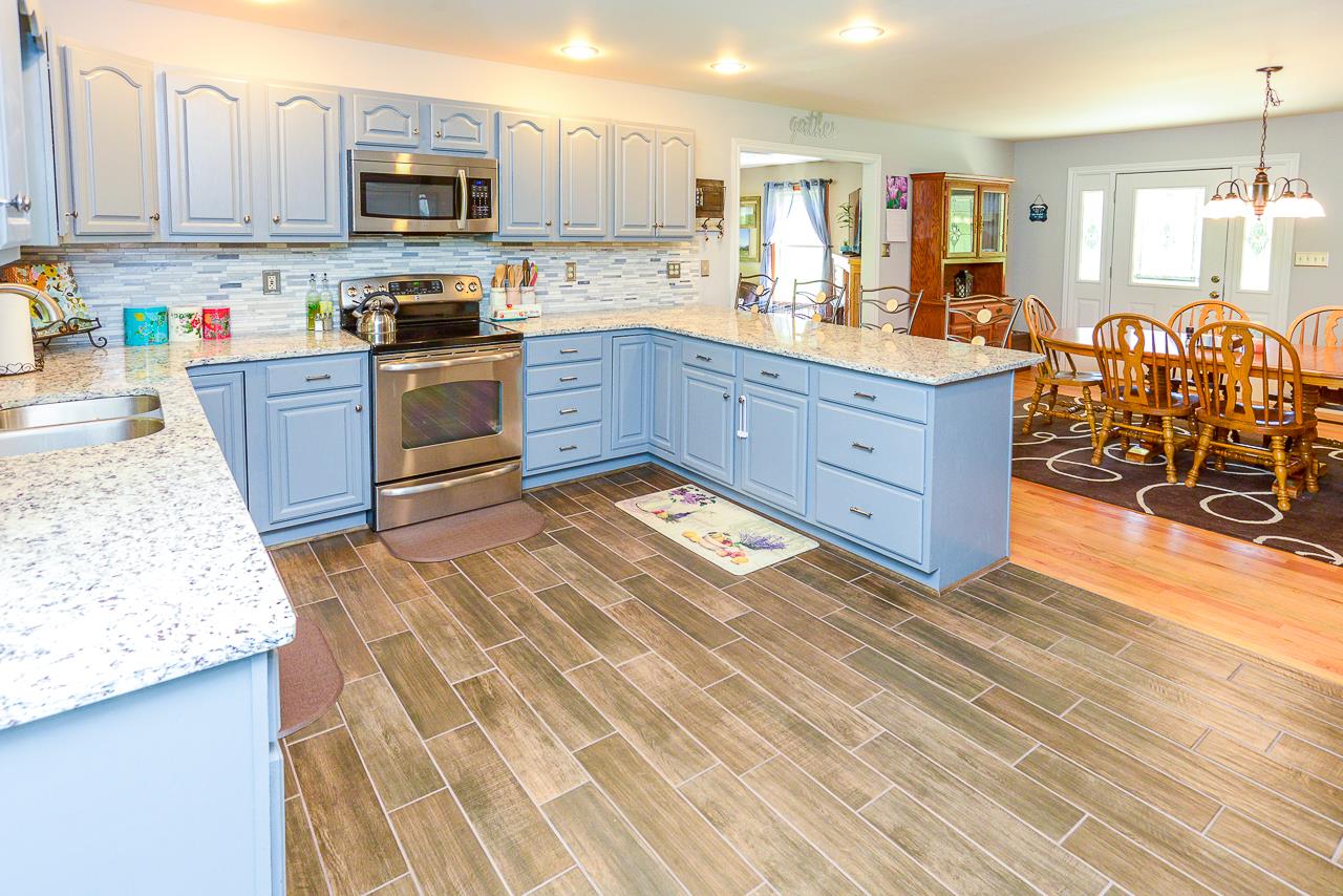 587 Damron Road Estill Springs, TN 37330 - Photo 9 of 30 Kitchen opens to the dining room.