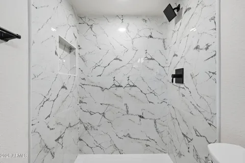 a bathroom with a shower curtain