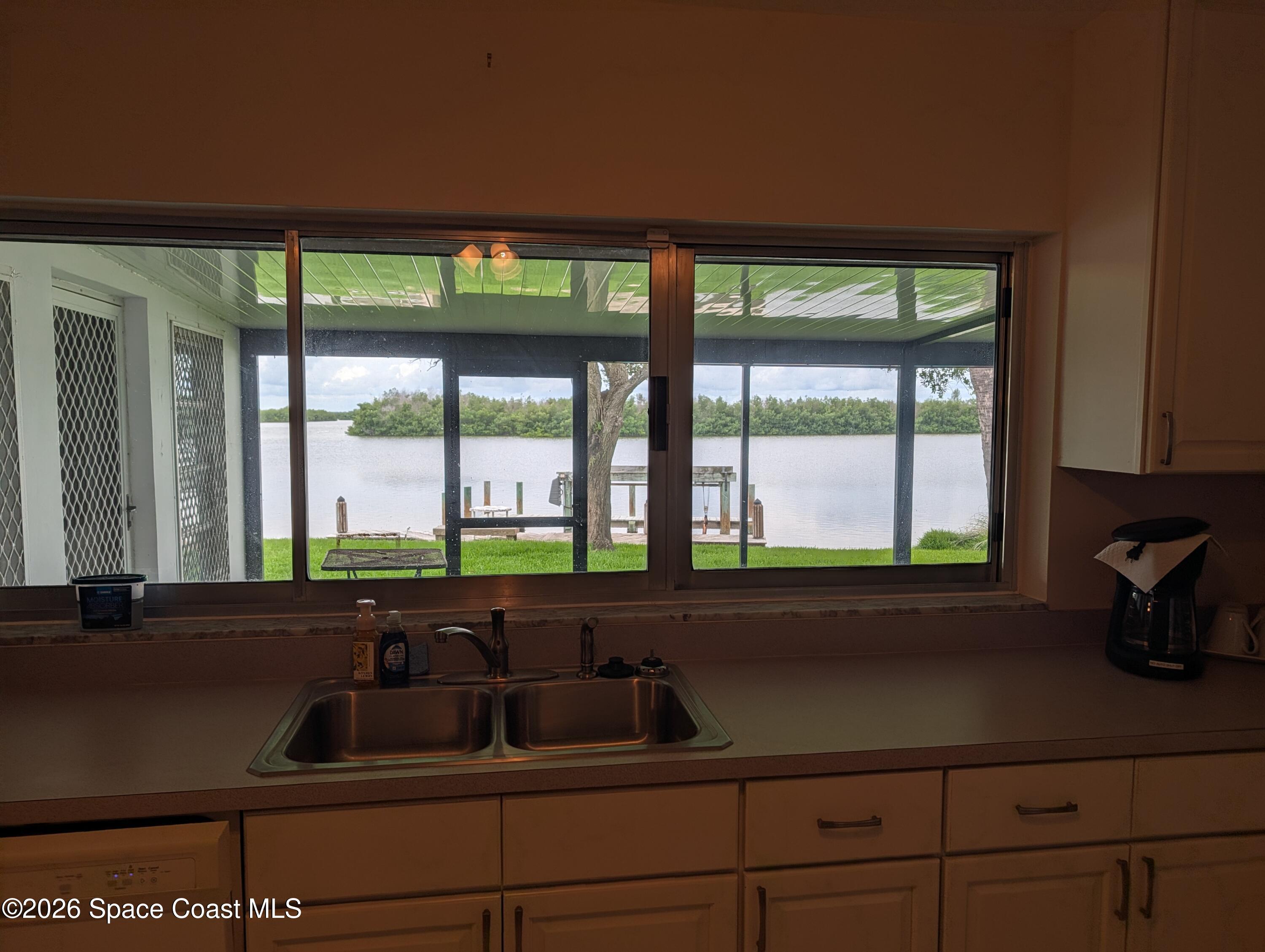 597 Capri Road Cocoa Beach, FL 32931 - Photo 13 of 33 PXL_20260609_170452342.MP