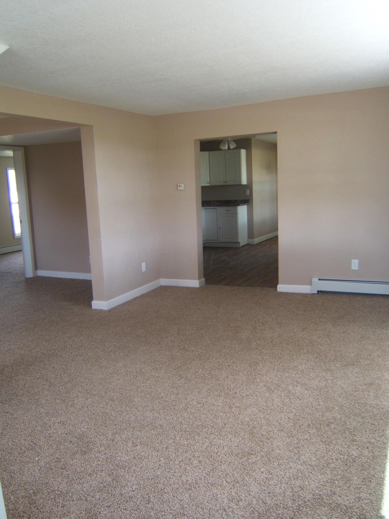 L799 Co Road Grelton, OH 43523 - Photo 9 of 25 Living room with a view into the kitchen