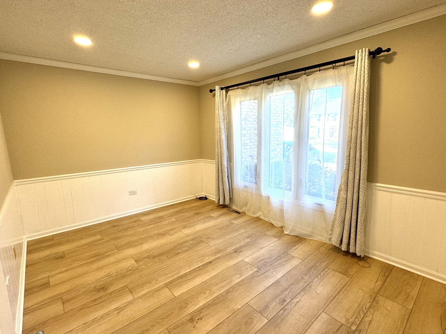 1398 East Gartner Road Naperville, IL 60540 - Photo 5 of 31 a view of an empty room with a window