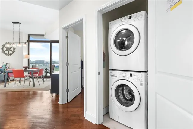 a view of a hallway with washer and dryer
