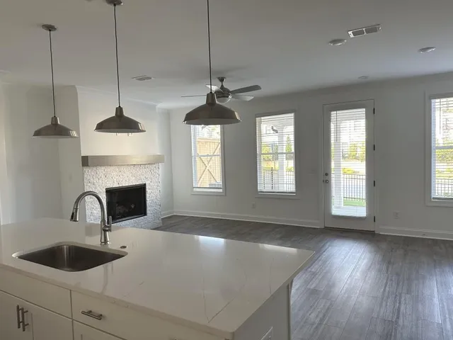 a kitchen with sink and window