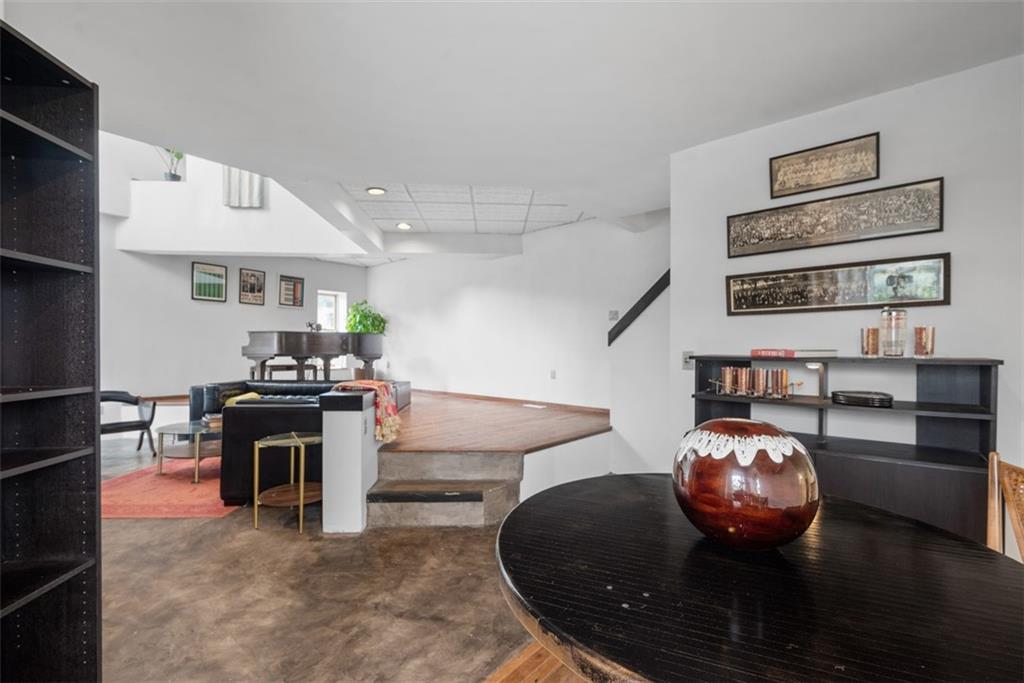 23 Seneca Street Pittsburgh, PA 15219 - Photo 13 of 38 a view of a living room and dining room