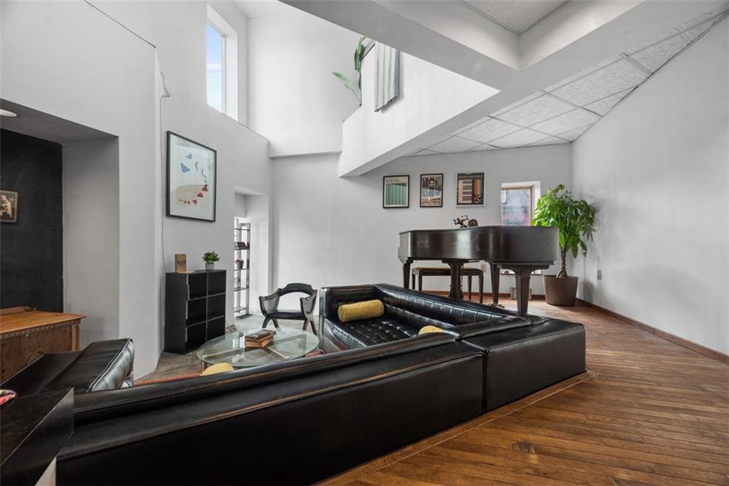 23 Seneca Street Pittsburgh, PA 15219 - Photo 2 of 38 a living room with furniture
