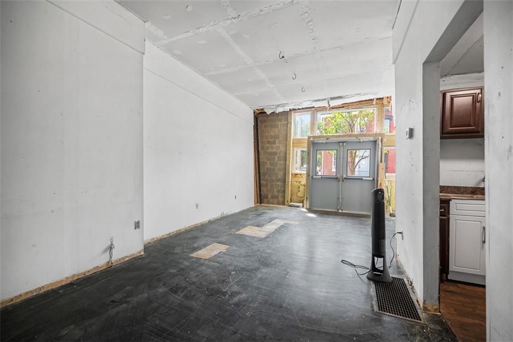 23 Seneca Street Pittsburgh, PA 15219 - Photo 26 of 38 a view of a room with gym equipment