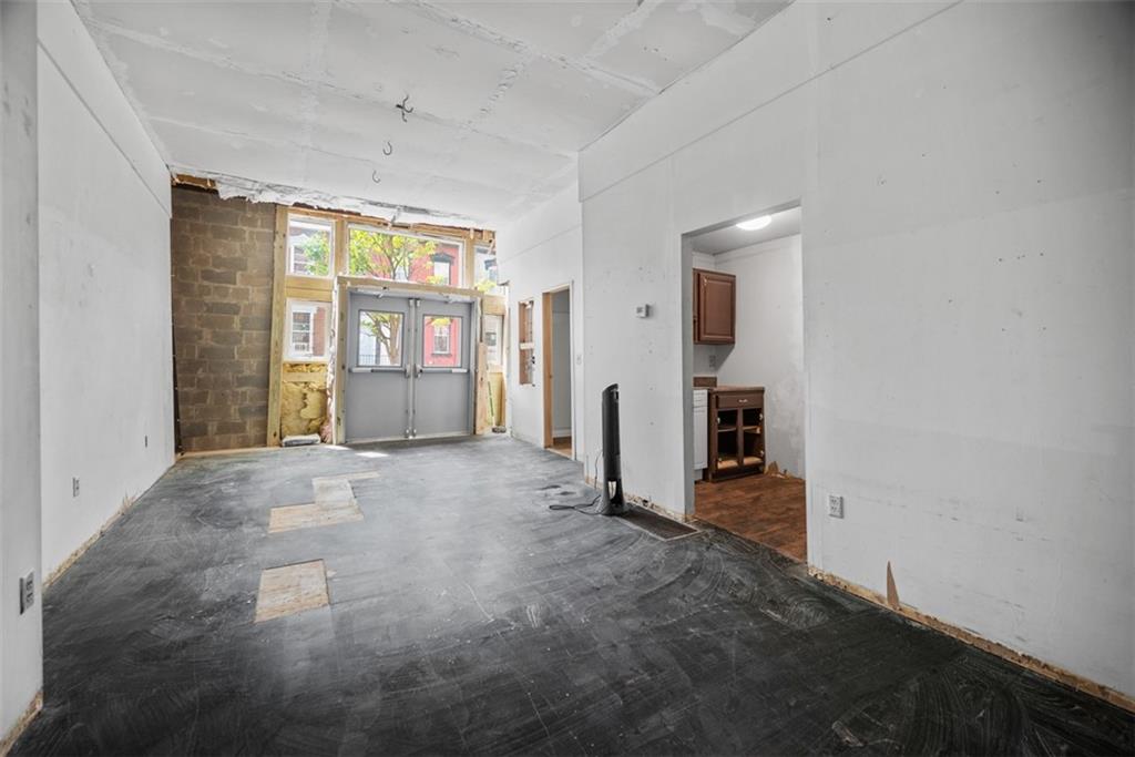 23 Seneca Street Pittsburgh, PA 15219 - Photo 27 of 38 an empty room with windows