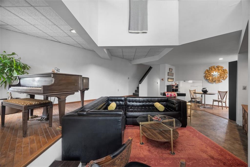 23 Seneca Street Pittsburgh, PA 15219 - Photo 3 of 38 a living room with furniture and wooden floor
