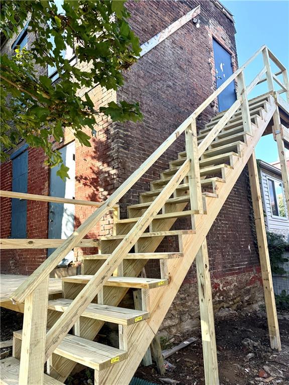 23 Seneca Street Pittsburgh, PA 15219 - Photo 31 of 38 a view of building with wooden stairs