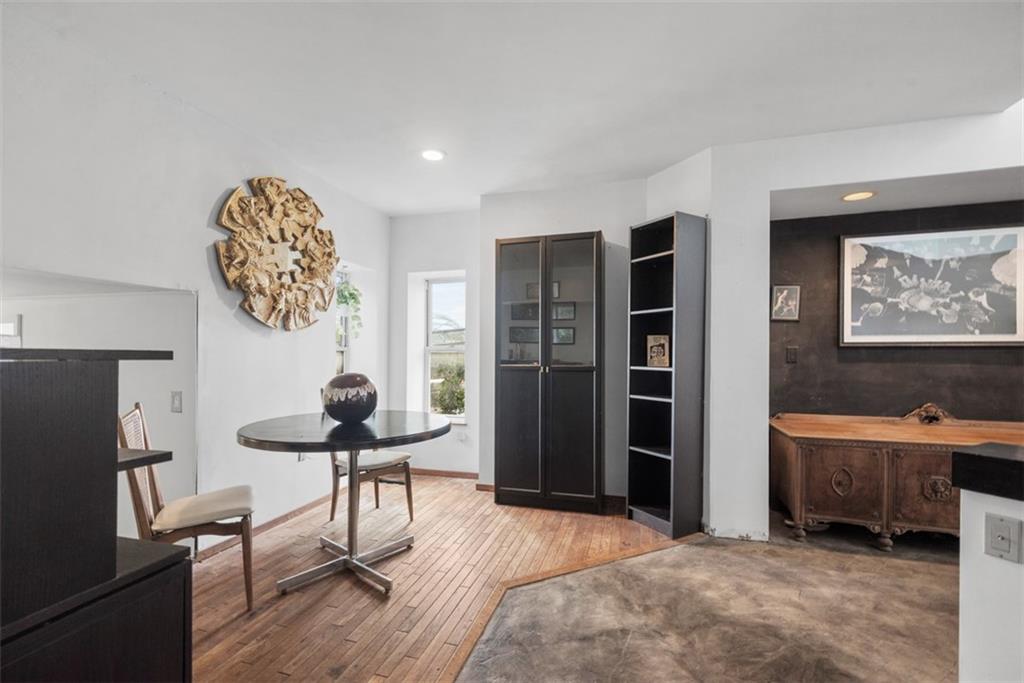 23 Seneca Street Pittsburgh, PA 15219 - Photo 9 of 38 a room with furniture and a window