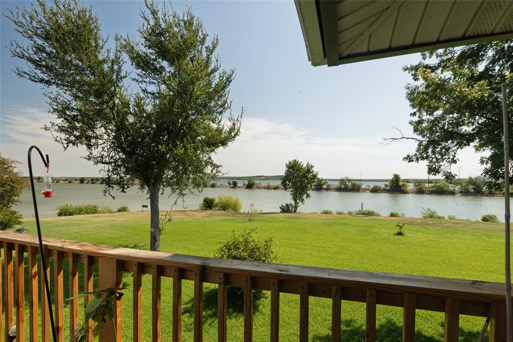 108 Harbor Drive, Unit 204 Runaway Bay, TX 76426 - Photo 2 of 22 a view of lake from a balcony